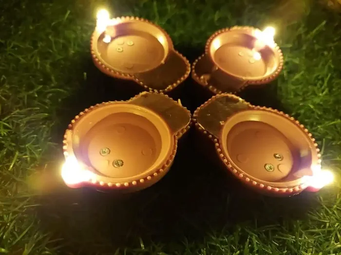 AROHANAM Smokeless Flameless Diya Pack of 12 Plastic LED Diyas Candle with Water Sensors E-Diya, with Ambient Lights for Decorations