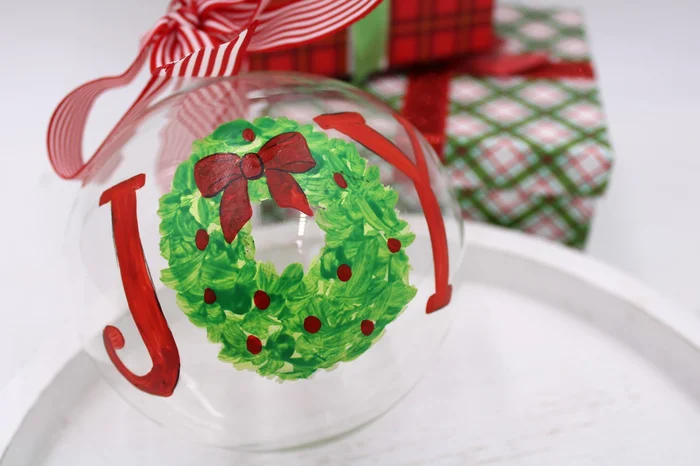 JOY HANDPAINTED GLASS ORNAMENT