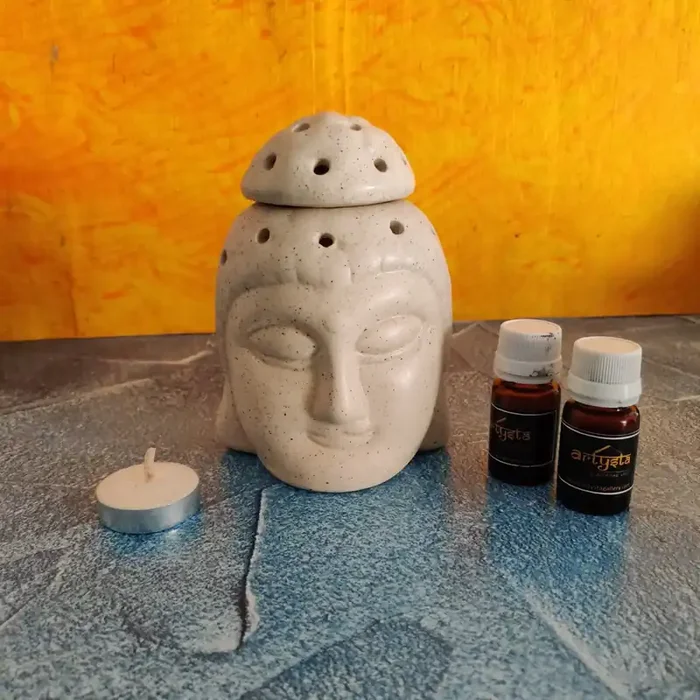 KHURJA POTTERY ‘Restful Buddha‘ Ceramic Aroma Diffuser for Home Aroma Oil Burner Fragrance Aroma Diffuser with Two Essential Oils (Ivory 3.9″ (L) 3.7″ (W) 5.5″ (H) Inch)