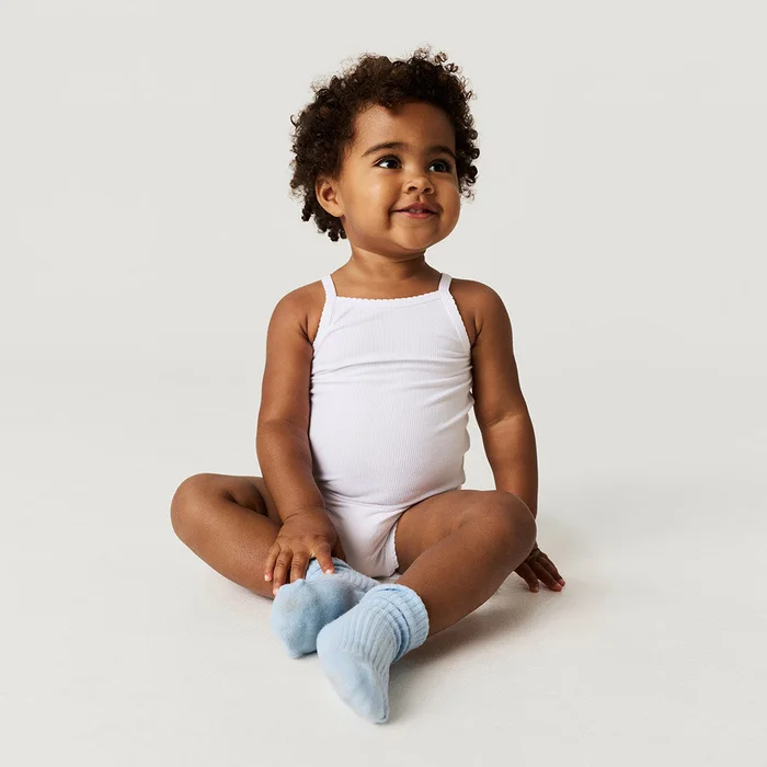 Solid White Sleeveless Optical White Premium Knit Rib Scallop Bodysuit | Posh Peanut®